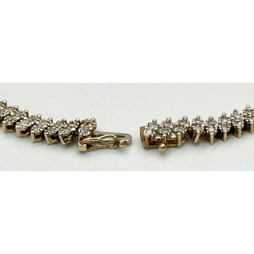 722 - A 9K YELLOW GOLD DIAMOND SET BRACELET. 0.75CT APPROX. 9.7G TOTAL WEIGHT. 18CM. M9004