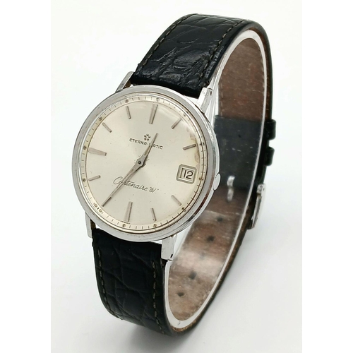 2009 - A Vintage Eterna-Matic 'Centernaire 61' Watch. Black leather strap. Stainless steel case - 36mm. Sil... 