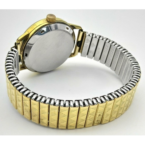 2074 - A Vintage Mudu Doublematic Gold Plated Gents Watch. Expandable bracelet. Case - 34mm. Silver tone di... 