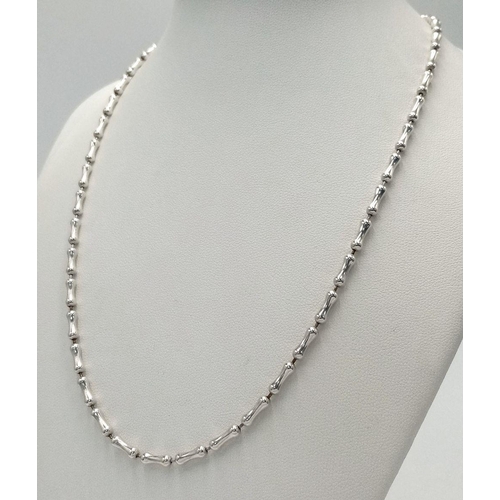 2428 - A 925 Silver Dogbone Link Necklace. 44cm. 14g