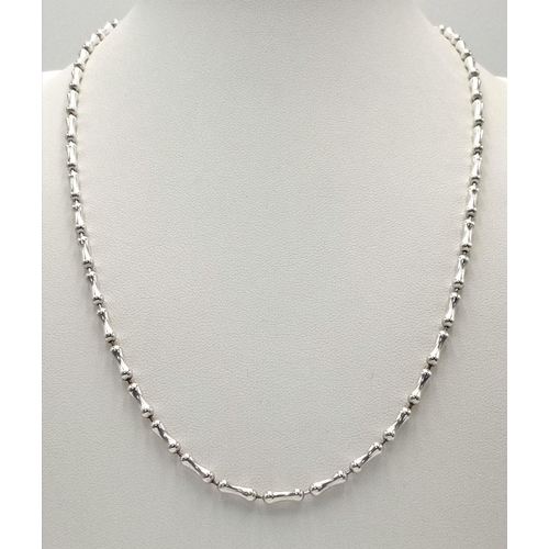 2428 - A 925 Silver Dogbone Link Necklace. 44cm. 14g