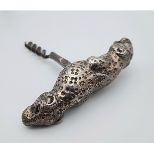 2483 - A vintage metal double leopard head corkscrew. Intricate features on faces, weighs 143 grams.