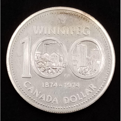 556 - A Commemorative Silver Canadian Dollar Celebrating Winnipeg. Please see photos for conditions. 23g