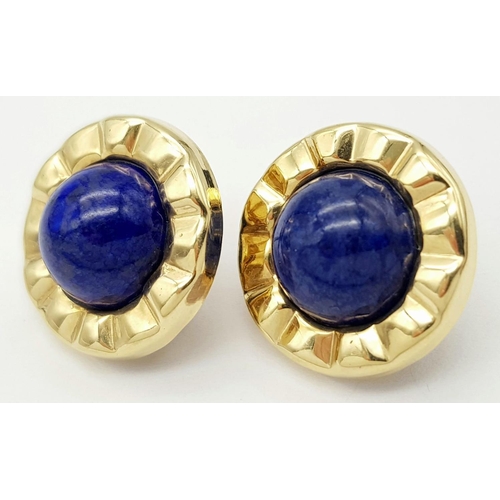 380 - A Pair of 14K Yellow Gold and Lapis Lazuli Earrings. Lapis cabochons on circular gold platforms. 22m... 