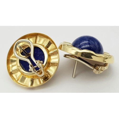 380 - A Pair of 14K Yellow Gold and Lapis Lazuli Earrings. Lapis cabochons on circular gold platforms. 22m... 