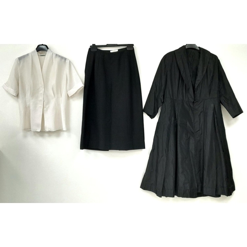 875 - A vintage office worker outfit consisting of black midi skirt, cream floaty blouse and a Matrix styl... 