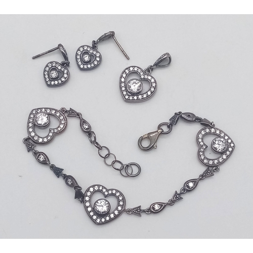 847 - A collection of vintage 925 silver CZ cluster heart jewellery include a pair of drop earrings, a pen... 