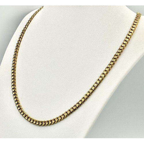 114 - An Italian 9K Yellow Gold Curb Link Chain. 50cm. 27.7g