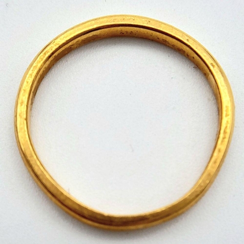 127 - A 22K Yellow Gold Band Ring. 2mm width. Size K. 2.57g.