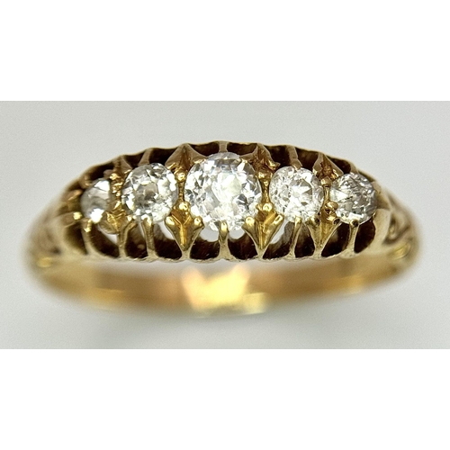 134 - An 18K Yellow Gold Five Diamond Ring. 0.60ctw of brilliant round cut diamonds. Size M. 2.9g total we... 