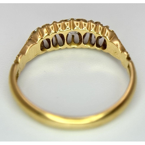 134 - An 18K Yellow Gold Five Diamond Ring. 0.60ctw of brilliant round cut diamonds. Size M. 2.9g total we... 