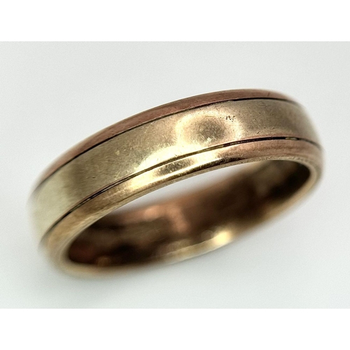 141 - A 9K Yellow Gold Band Ring. 6mm width. 4.8g