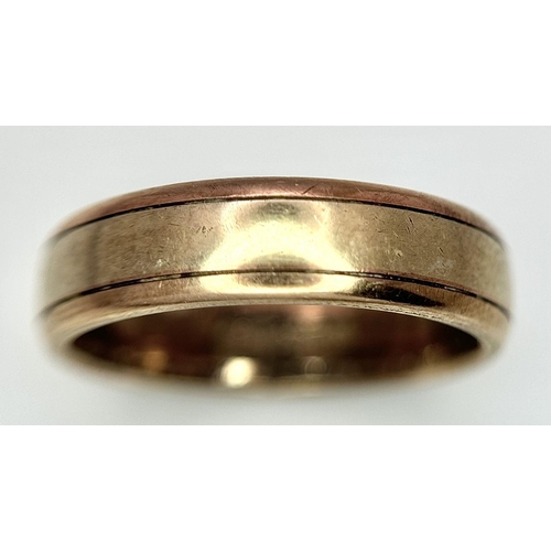 141 - A 9K Yellow Gold Band Ring. 6mm width. 4.8g