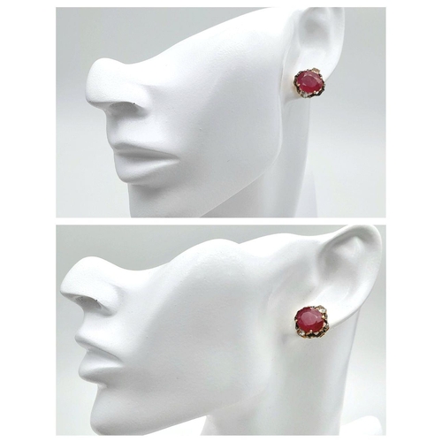 35 - A Pair of Ruby and Diamond Stud Earrings. Set in gilded 925 Silver. Ruby approx 4ctw. and Diamonds a... 