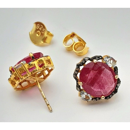 35 - A Pair of Ruby and Diamond Stud Earrings. Set in gilded 925 Silver. Ruby approx 4ctw. and Diamonds a... 