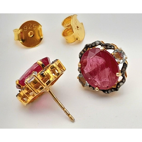 35 - A Pair of Ruby and Diamond Stud Earrings. Set in gilded 925 Silver. Ruby approx 4ctw. and Diamonds a... 