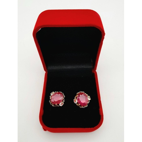 35 - A Pair of Ruby and Diamond Stud Earrings. Set in gilded 925 Silver. Ruby approx 4ctw. and Diamonds a... 