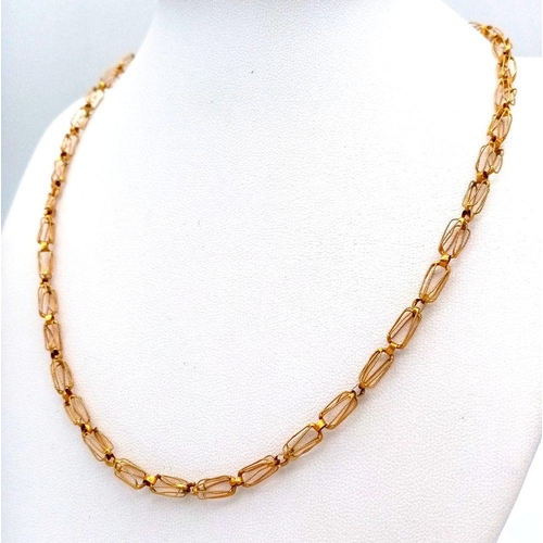 50 - A 22K Yellow Gold Intricate Link Necklace. 42cm. 8.05g.