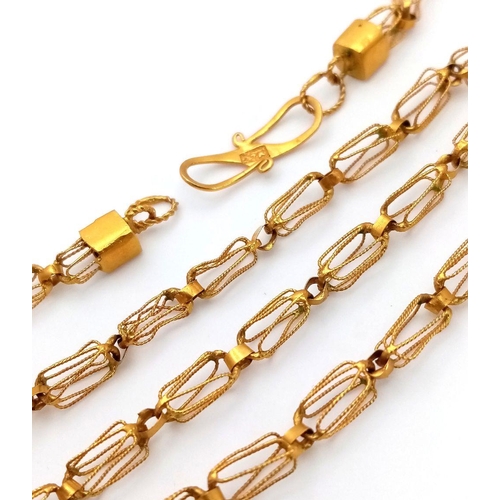 50 - A 22K Yellow Gold Intricate Link Necklace. 42cm. 8.05g.