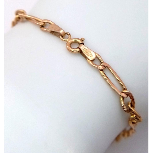 51 - A 9K Yellow Gold Figaro Link Bracelet. 17cm. 1.6g