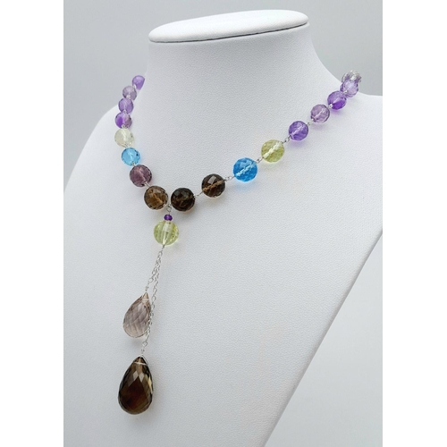 54 - An Amethyst, Citrine and Smoky Quartz Drop Necklace - Set in 925 Silver. 7cm drop. 54cm necklace len... 