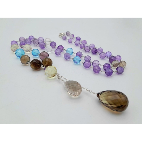 54 - An Amethyst, Citrine and Smoky Quartz Drop Necklace - Set in 925 Silver. 7cm drop. 54cm necklace len... 