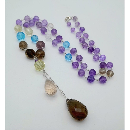 54 - An Amethyst, Citrine and Smoky Quartz Drop Necklace - Set in 925 Silver. 7cm drop. 54cm necklace len... 