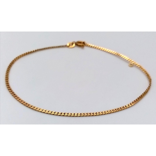 57 - An 18K Yellow Gold Scale Link Flat Bracelet. 19cm. Charm attachment. 2.4g.