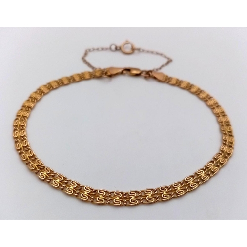 58 - A Vintage Italian 9K Yellow Gold Intricate Link Bracelet with Safety Chain. 18cm. 2.3g.