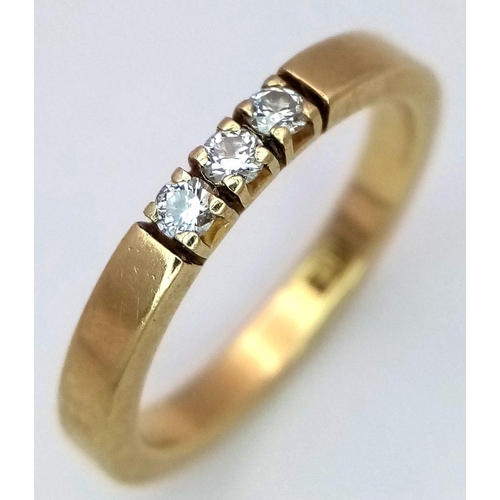 78 - A Stylish 14K Yellow Gold Diamond Trilogy Band Ring. Size I. 2.7g.