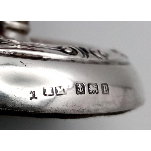 92 - An Antique 1914 Sterling Silver Tree Ring. Hallmarks for Birmingham 1914. Weighted base. 8cm tall. 6... 