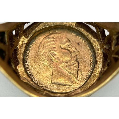 106 - A 9K Yellow Gold Mexican Coin Signet Ring. Size N. 2.58g.