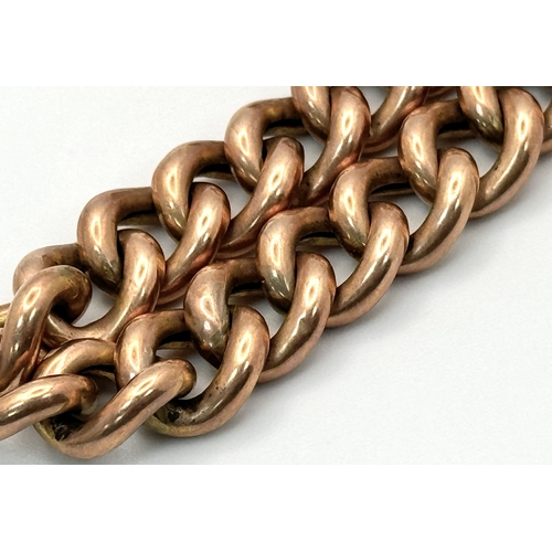 121 - A Vintage 9K Rose Gold Curb Link Bracelet with Heart Clasp. 
18cm. 16.4g.