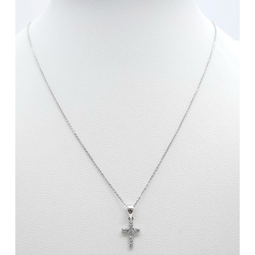 559 - An Italian 18K White Gold Necklace with a 9K gold Stone Set Cross Pendant. 40cm and 15mm. 1.25g tota... 