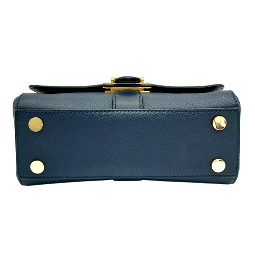 48 - An Aspinal of London Blue Lottie Letterbox Bag. Leather exterior with gold-toned hardware, chain and... 