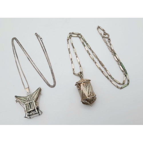 540 - Two Vintage Silver filigree Necklaces with Hanging Asian Themed Pendants. Intricate pierced and fili... 