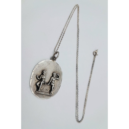 903 - A vintage Sterling Silver Cherubic Ornate Pendant with Sterling Silver Necklace. 50 and 4cm. 7.5g