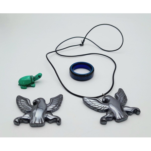 944 - An Eclectic Mix of Four Items.