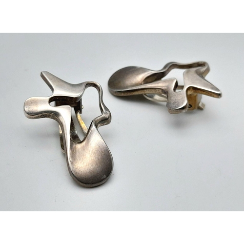 96 - A Pair of Vintage 925 Silver Georg Jensen Abstract Clip On Earrings. In original box.