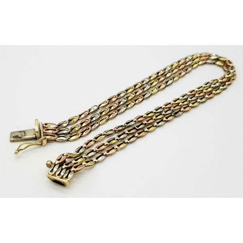 6 - A 3 coloured gold bracelet with 3 rows of alternating coloured 9k gold links.    8.5gms