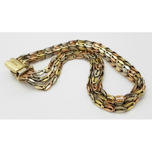 6 - A 3 coloured gold bracelet with 3 rows of alternating coloured 9k gold links.    8.5gms