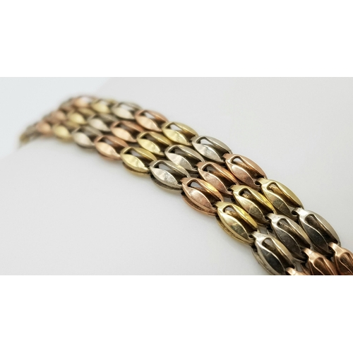 6 - A 3 coloured gold bracelet with 3 rows of alternating coloured 9k gold links.    8.5gms