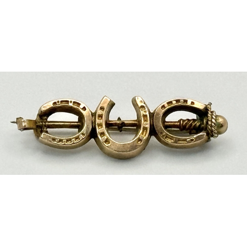 105 - A Vintage 9 Carat Gold Lucky Horseshoe Brooch-3.4cm Length. Gross Weight 1.69 Grams