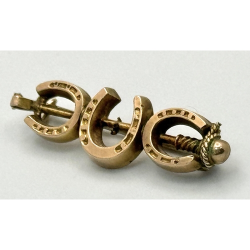 105 - A Vintage 9 Carat Gold Lucky Horseshoe Brooch-3.4cm Length. Gross Weight 1.69 Grams