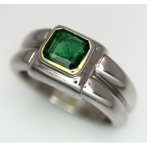 136 - A Princess Cut 0.75ct Mesmerising Emerald Set in a Platinum Ring. Size L 1/2. 14.6g total weight.