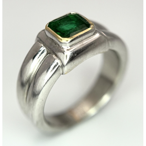 136 - A Princess Cut 0.75ct Mesmerising Emerald Set in a Platinum Ring. Size L 1/2. 14.6g total weight.