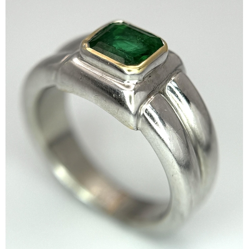 136 - A Princess Cut 0.75ct Mesmerising Emerald Set in a Platinum Ring. Size L 1/2. 14.6g total weight.