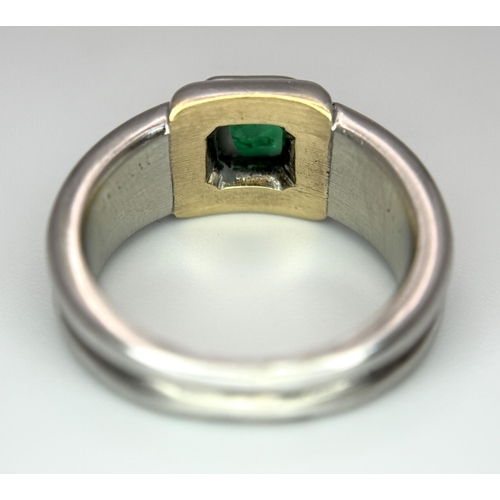 136 - A Princess Cut 0.75ct Mesmerising Emerald Set in a Platinum Ring. Size L 1/2. 14.6g total weight.