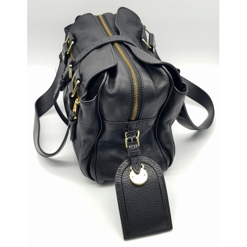 118 - A Mulberry Black Mabel Satchel Bag. Black leather exterior with gold-toned hardware and dual leather... 