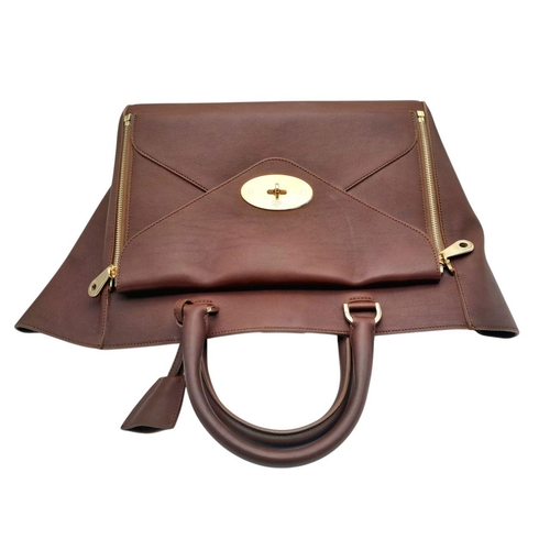 125 - A Mulberry Willow Tote Bag. Brown leather exterior with silver-toned hardware, magnetic top closure,... 